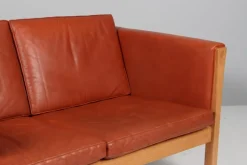 Hot Pamono Danish Two-Seat Sofa in Leather and Oak by Hans J. Wegner, 1960s