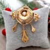 Sale Pamono Gold Brooch with Applications