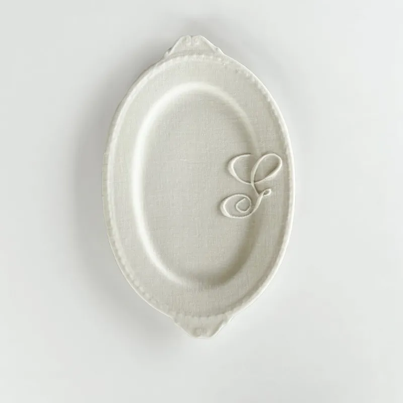 Pamono Hand Made White Porcelain Platter with Embroidered Letter Geneviève by Studio Desimonewayland> Decorative Plates