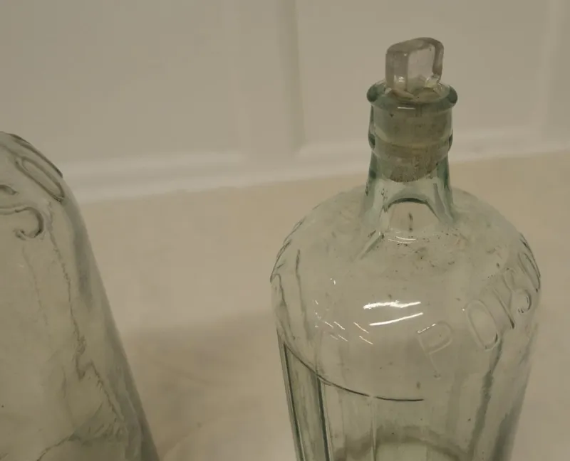Pamono Large 19th Century Clear Glass Pharmacy Poison Bottles, Unkns, Set of 2> Bottles, Carafes & Jugs