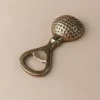 Pamono Mid-Century Golf Ball Bottle Opener in Brass, Italy, 1960s