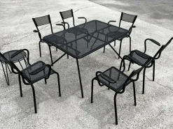 Pamono Perforated Metal Armchairs and Table in the style of Mathieu Matégot, 1950s, Set of 7