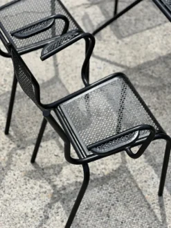 Pamono Perforated Metal Armchairs and Table in the style of Mathieu Matégot, 1950s, Set of 7