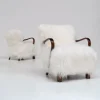 Pamono Scandinavian Art Deco Lounge Chairs in Mongolian Sheepskin, 1950s, Set of 2> Lounge Chairs & Armchairs