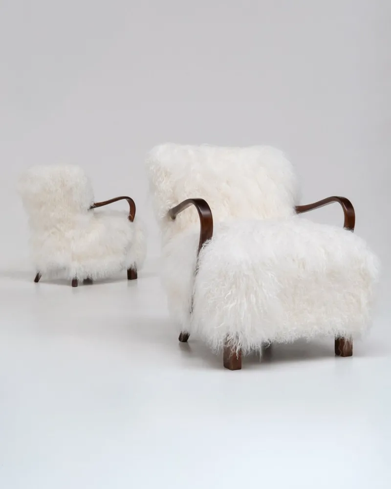 Pamono Scandinavian Art Deco Lounge Chairs in Mongolian Sheepskin, 1950s, Set of 2> Lounge Chairs & Armchairs