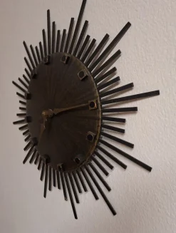 Pamono Vintage Wall Clock Sunburst with Brown Dial and Black Metal Rays from Luxus, 1970s><noscript><img width=