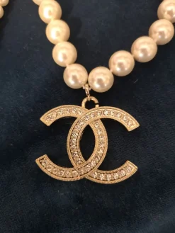 Pamono White and Gold Chanel Necklace Pendant from Chanel><noscript><img width=